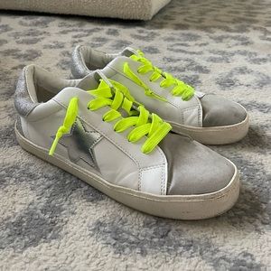 Star sneaker with neon and silver accents